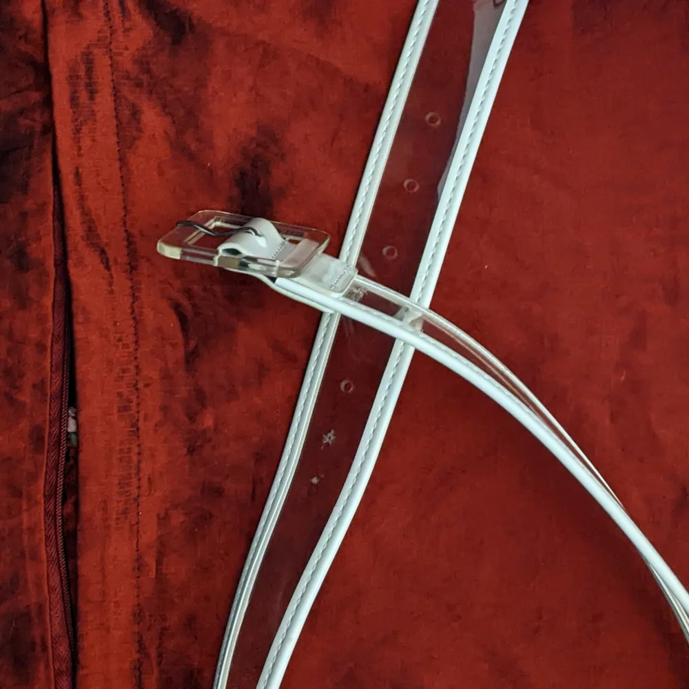 Set Of Two Clear and White Belts One With Tag Brandy Melville 36